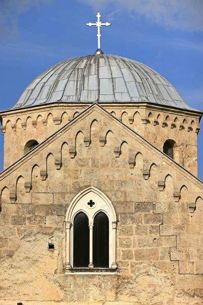 Part of the western facade of the church and the dome