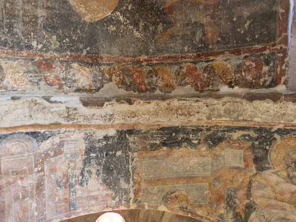 Detail of the ornament at the base of the tambour and remains of the inscription in the dome ring