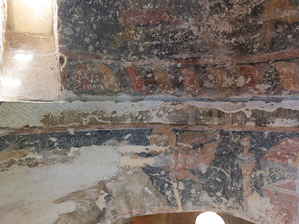 Detail of the ornament at the base of the tambour and remains of the inscription in the dome ring